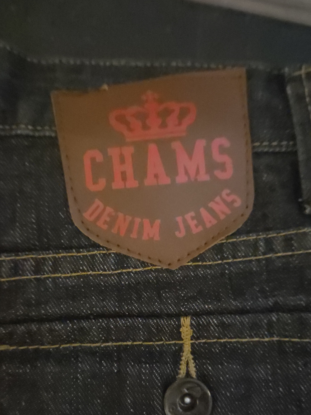 Champs Dark Indigo Jeans with Pink Logo Patch